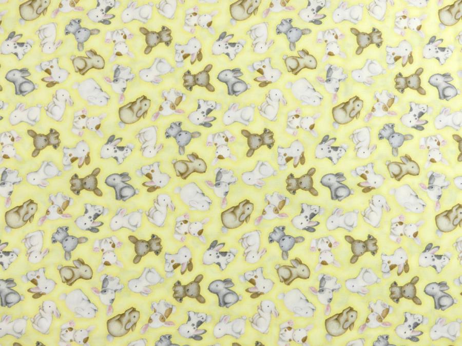 Patchworkstoff mit süßen Hasenbabies auf gelben Hintergrund